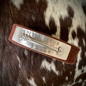 Stamped “Follow Your Arrow'  Leather Cuff Bracelet, up to 6 3/4” wrist